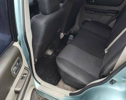 Зелений Ніссан ІксТрейл, об'ємом двигуна 2.18 л та пробігом 372 тис. км за 6100 $, фото 9 на Automoto.ua