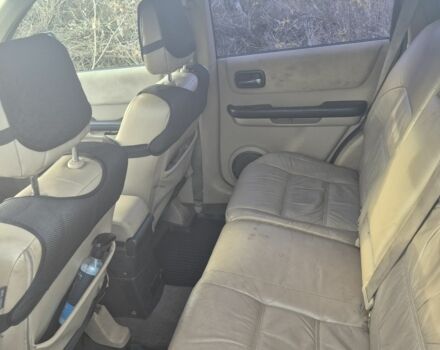 Зеленый Ниссан ИксТрейл, объемом двигателя 2 л и пробегом 334 тыс. км за 3974 $, фото 7 на Automoto.ua