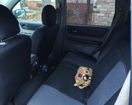 Зеленый Ниссан ИксТрейл, объемом двигателя 2.2 л и пробегом 406 тыс. км за 2135 $, фото 5 на Automoto.ua