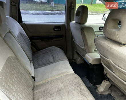 Зеленый Ниссан ИксТрейл, объемом двигателя 2 л и пробегом 308 тыс. км за 5700 $, фото 12 на Automoto.ua