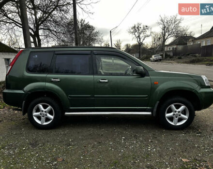 Зеленый Ниссан ИксТрейл, объемом двигателя 2 л и пробегом 308 тыс. км за 5700 $, фото 2 на Automoto.ua