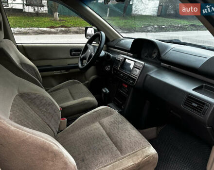 Зеленый Ниссан ИксТрейл, объемом двигателя 2 л и пробегом 308 тыс. км за 5700 $, фото 15 на Automoto.ua