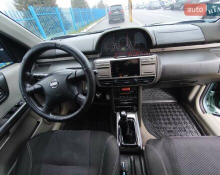 Зелений Ніссан ІксТрейл, об'ємом двигуна 2.18 л та пробігом 372 тис. км за 6100 $, фото 5 на Automoto.ua