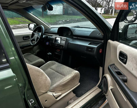 Зеленый Ниссан ИксТрейл, объемом двигателя 2 л и пробегом 308 тыс. км за 5700 $, фото 14 на Automoto.ua