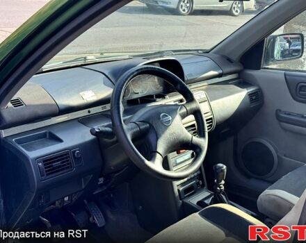 Зеленый Ниссан ИксТрейл, объемом двигателя 2.2 л и пробегом 300 тыс. км за 3199 $, фото 8 на Automoto.ua