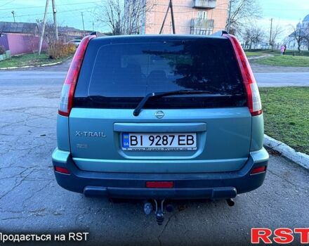 Зелений Ніссан ІксТрейл, об'ємом двигуна 2 л та пробігом 250 тис. км за 6200 $, фото 2 на Automoto.ua