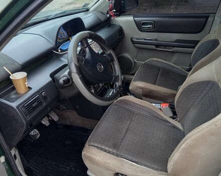 Зеленый Ниссан ИксТрейл, объемом двигателя 2.2 л и пробегом 267 тыс. км за 2951 $, фото 8 на Automoto.ua