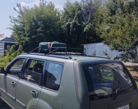 Зеленый Ниссан ИксТрейл, объемом двигателя 2 л и пробегом 300 тыс. км за 2700 $, фото 1 на Automoto.ua