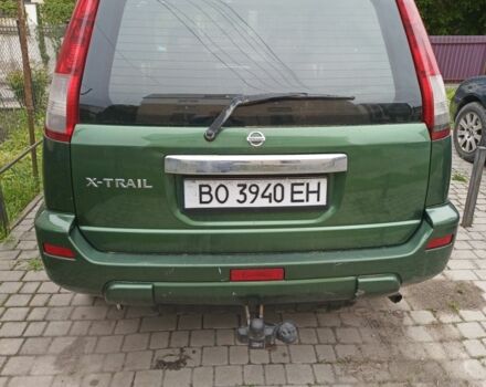 Зеленый Ниссан ИксТрейл, объемом двигателя 2 л и пробегом 350 тыс. км за 4400 $, фото 1 на Automoto.ua
