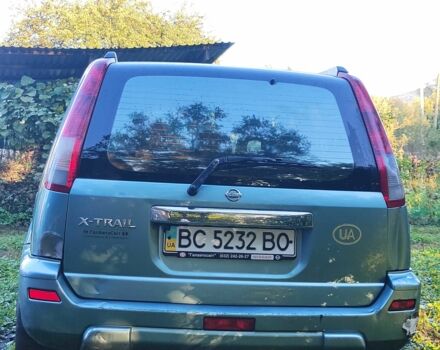Зелений Ніссан ІксТрейл, об'ємом двигуна 2 л та пробігом 442 тис. км за 5304 $, фото 3 на Automoto.ua