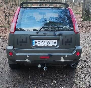 Зелений Ніссан ІксТрейл, об'ємом двигуна 2 л та пробігом 300 тис. км за 5200 $, фото 1 на Automoto.ua