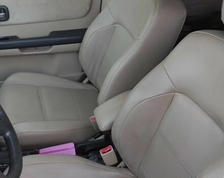 Зелений Ніссан ІксТрейл, об'ємом двигуна 2 л та пробігом 442 тис. км за 5304 $, фото 6 на Automoto.ua