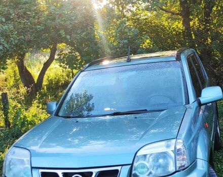 Зелений Ніссан ІксТрейл, об'ємом двигуна 2 л та пробігом 442 тис. км за 5304 $, фото 1 на Automoto.ua