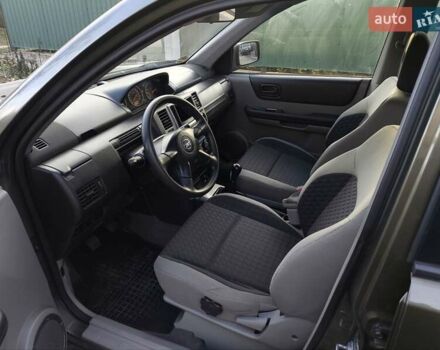Зеленый Ниссан ИксТрейл, объемом двигателя 2 л и пробегом 145 тыс. км за 7250 $, фото 17 на Automoto.ua