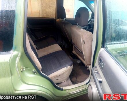 Зеленый Ниссан ИксТрейл, объемом двигателя 2.2 л и пробегом 320 тыс. км за 2450 $, фото 4 на Automoto.ua