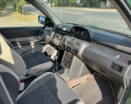 Зеленый Ниссан ИксТрейл, объемом двигателя 2.2 л и пробегом 300 тыс. км за 2999 $, фото 9 на Automoto.ua