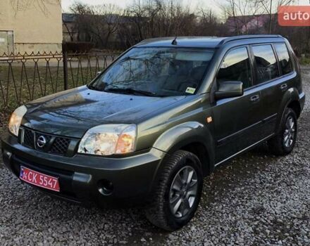 Зеленый Ниссан ИксТрейл, объемом двигателя 2 л и пробегом 145 тыс. км за 7250 $, фото 4 на Automoto.ua