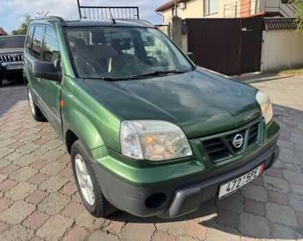 Зеленый Ниссан ИксТрейл, объемом двигателя 2.2 л и пробегом 300 тыс. км за 2999 $, фото 2 на Automoto.ua