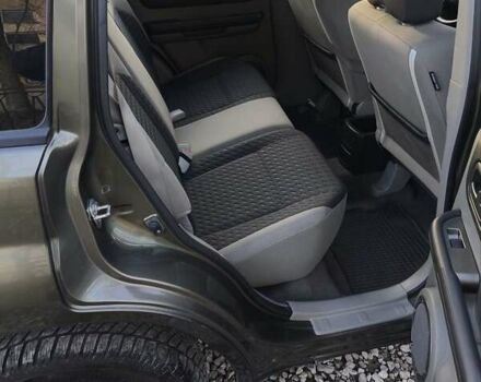 Зеленый Ниссан ИксТрейл, объемом двигателя 2 л и пробегом 145 тыс. км за 7250 $, фото 18 на Automoto.ua