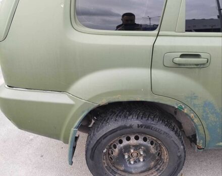 Зеленый Ниссан ИксТрейл, объемом двигателя 2.2 л и пробегом 250 тыс. км за 3900 $, фото 7 на Automoto.ua