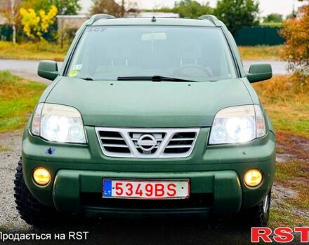 Зеленый Ниссан ИксТрейл, объемом двигателя 2.2 л и пробегом 330 тыс. км за 3250 $, фото 1 на Automoto.ua