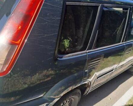 Зеленый Ниссан ИксТрейл, объемом двигателя 2.5 л и пробегом 309 тыс. км за 4842 $, фото 2 на Automoto.ua