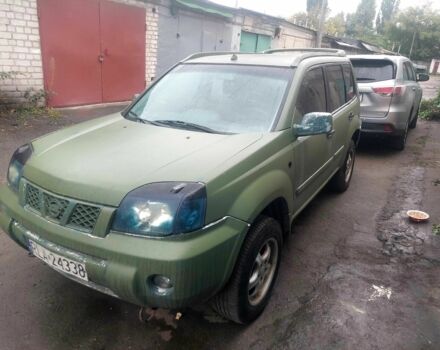 Зеленый Ниссан ИксТрейл, объемом двигателя 2 л и пробегом 300 тыс. км за 2450 $, фото 1 на Automoto.ua