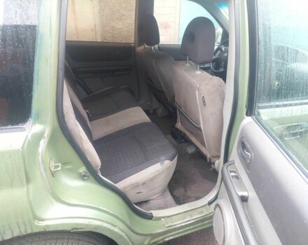 Зеленый Ниссан ИксТрейл, объемом двигателя 2 л и пробегом 300 тыс. км за 2450 $, фото 4 на Automoto.ua