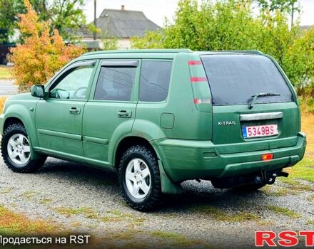 Зеленый Ниссан ИксТрейл, объемом двигателя 2.2 л и пробегом 330 тыс. км за 3250 $, фото 2 на Automoto.ua
