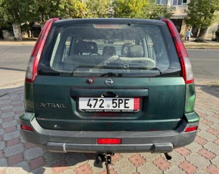 Зеленый Ниссан ИксТрейл, объемом двигателя 2.2 л и пробегом 300 тыс. км за 2999 $, фото 4 на Automoto.ua