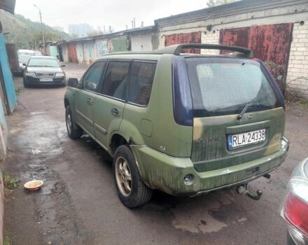 Зеленый Ниссан ИксТрейл, объемом двигателя 2 л и пробегом 300 тыс. км за 2450 $, фото 2 на Automoto.ua