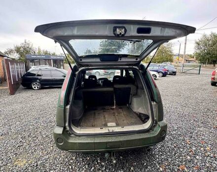 Зеленый Ниссан ИксТрейл, объемом двигателя 2.2 л и пробегом 300 тыс. км за 3000 $, фото 4 на Automoto.ua