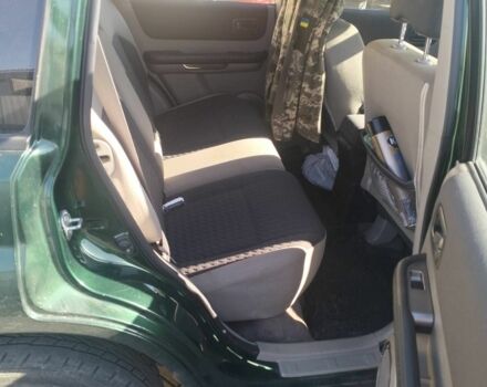 Зеленый Ниссан ИксТрейл, объемом двигателя 2.2 л и пробегом 210 тыс. км за 4200 $, фото 4 на Automoto.ua