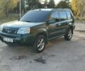 Зеленый Ниссан ИксТрейл, объемом двигателя 2.2 л и пробегом 394 тыс. км за 4700 $, фото 2 на Automoto.ua