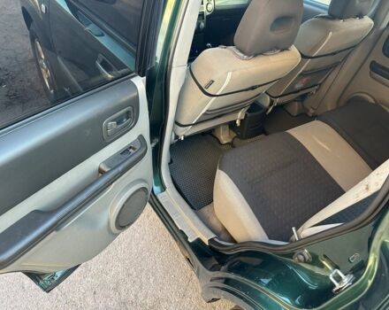 Зеленый Ниссан ИксТрейл, объемом двигателя 2.2 л и пробегом 394 тыс. км за 4700 $, фото 10 на Automoto.ua