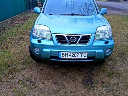 Зеленый Ниссан ИксТрейл, объемом двигателя 2 л и пробегом 160 тыс. км за 5600 $, фото 1 на Automoto.ua