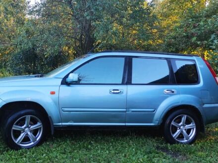 Зелений Ніссан ІксТрейл, об'ємом двигуна 2 л та пробігом 442 тис. км за 5304 $, фото 1 на Automoto.ua