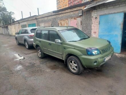 Зеленый Ниссан ИксТрейл, объемом двигателя 2 л и пробегом 300 тыс. км за 2450 $, фото 1 на Automoto.ua
