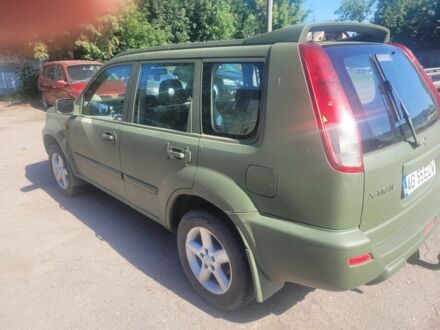 Зелений Ніссан ІксТрейл, об'ємом двигуна 2 л та пробігом 230 тис. км за 3350 $, фото 1 на Automoto.ua