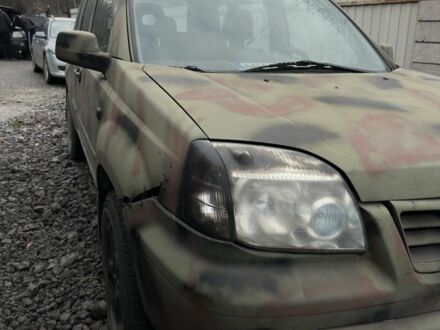 Зеленый Ниссан ИксТрейл, объемом двигателя 2 л и пробегом 235 тыс. км за 1600 $, фото 1 на Automoto.ua