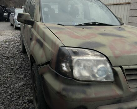 Зеленый Ниссан ИксТрейл, объемом двигателя 2 л и пробегом 235 тыс. км за 1600 $, фото 1 на Automoto.ua