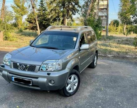 Зелений Ніссан ІксТрейл, об'ємом двигуна 2.5 л та пробігом 92 тис. км за 8000 $, фото 1 на Automoto.ua