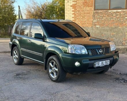 Зеленый Ниссан ИксТрейл, объемом двигателя 2.2 л и пробегом 394 тыс. км за 4700 $, фото 1 на Automoto.ua