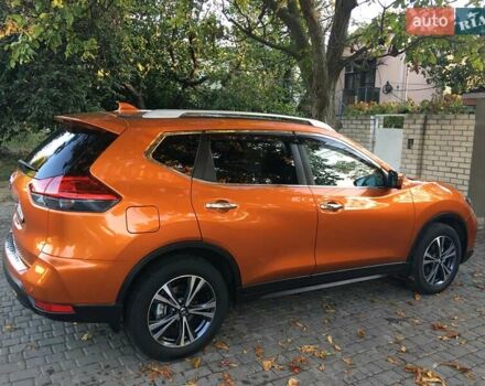Оранжевый Ниссан ИксТрейл, объемом двигателя 2 л и пробегом 73 тыс. км за 20000 $, фото 2 на Automoto.ua