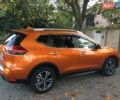 Оранжевый Ниссан ИксТрейл, объемом двигателя 2 л и пробегом 73 тыс. км за 20000 $, фото 2 на Automoto.ua