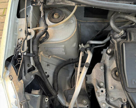 Серый Ниссан Latio, объемом двигателя 0 л и пробегом 95 тыс. км за 5900 $, фото 14 на Automoto.ua