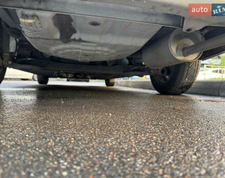 Серый Ниссан Latio, объемом двигателя 0 л и пробегом 95 тыс. км за 5900 $, фото 12 на Automoto.ua