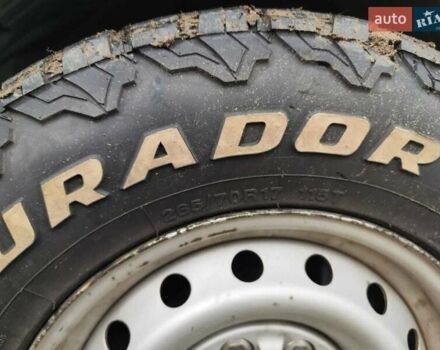 Белый Ниссан NV1500, объемом двигателя 4 л и пробегом 128 тыс. км за 27000 $, фото 2 на Automoto.ua