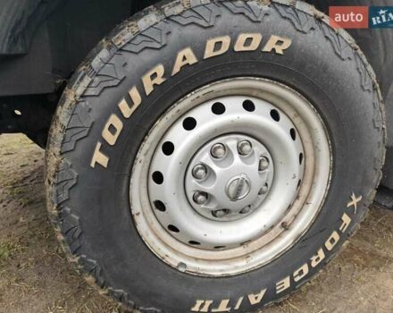 Белый Ниссан NV1500, объемом двигателя 4 л и пробегом 128 тыс. км за 27000 $, фото 3 на Automoto.ua