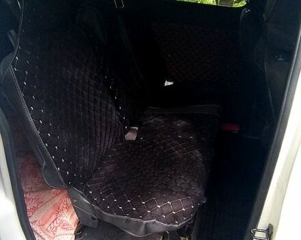 Белый Ниссан NV200, объемом двигателя 1.5 л и пробегом 244 тыс. км за 10300 $, фото 3 на Automoto.ua